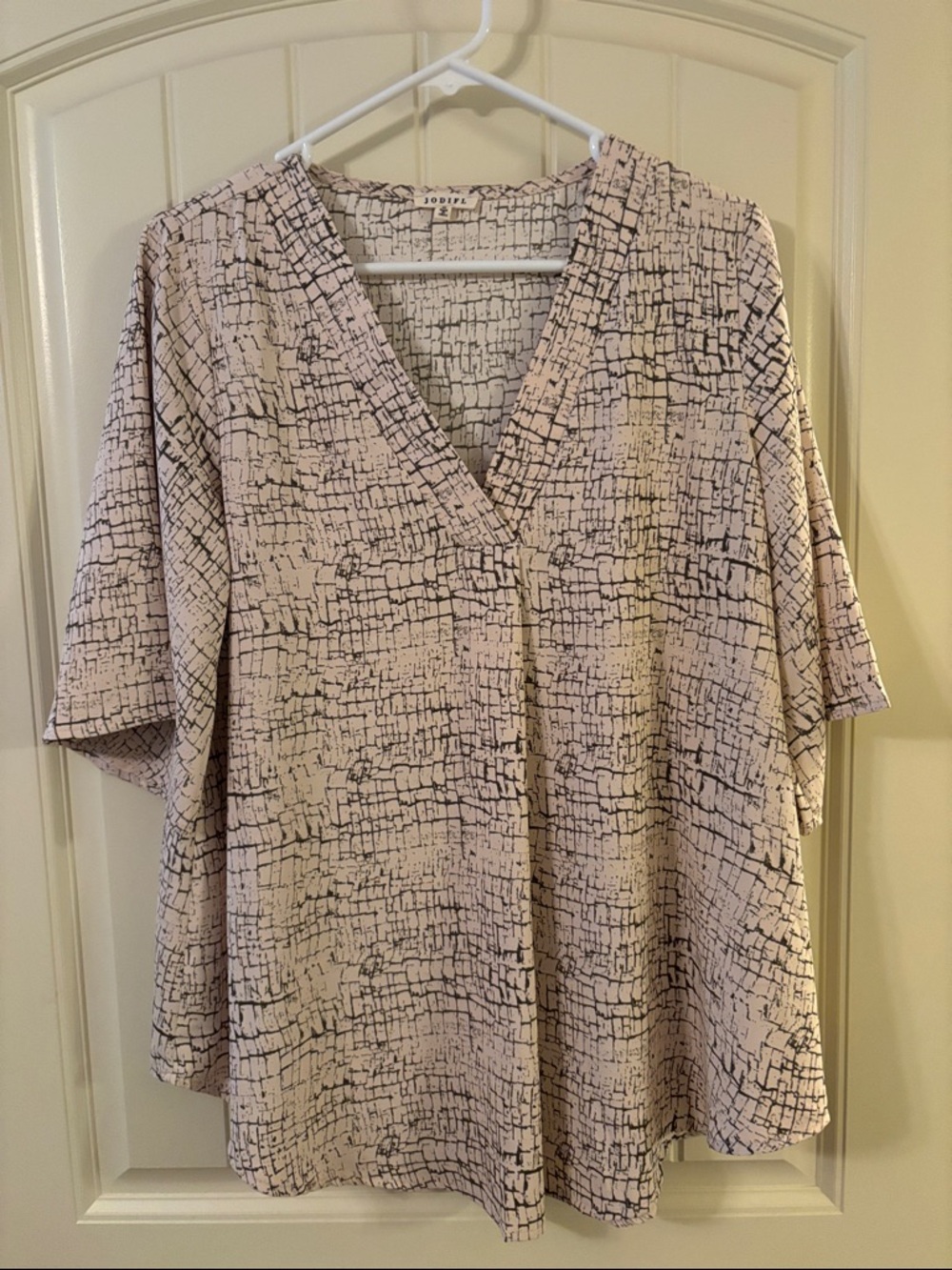 JODIFL Cream and Black Abstract Grid V-Neck Tunic Top